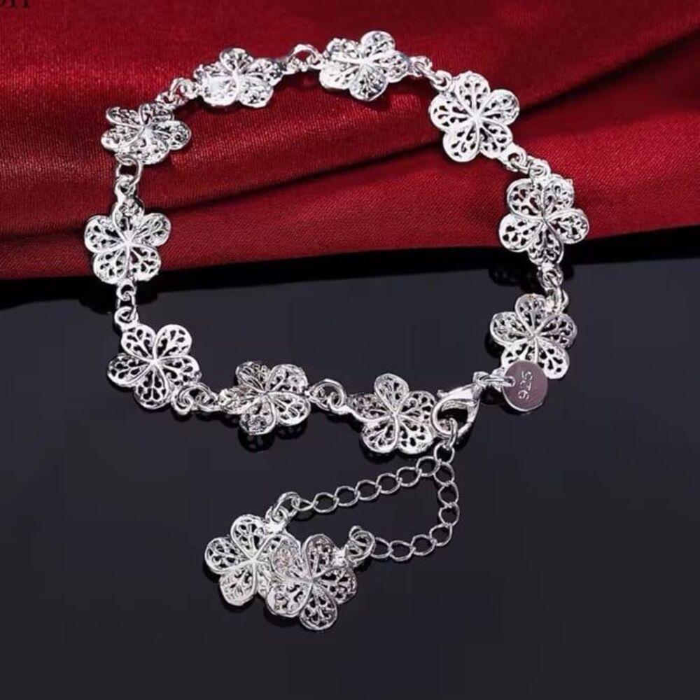 The Boho Flower sterling silver bracelet with dangling flowers